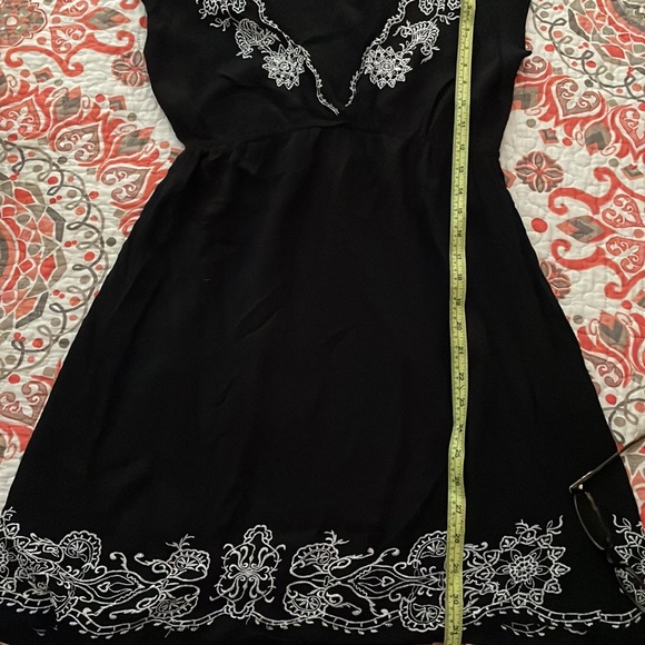 Angie flirty black dress! Embroidered top and hem. - Picture 7 of 8
